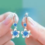 bijoux en métal bleu fleurs