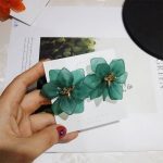boucle d'oreille élégante pétale de fleur