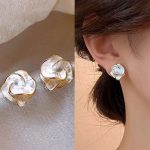 création artisanale boucle d'oreille fleur blanche