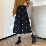 jupe longue avec motifs de marguerites